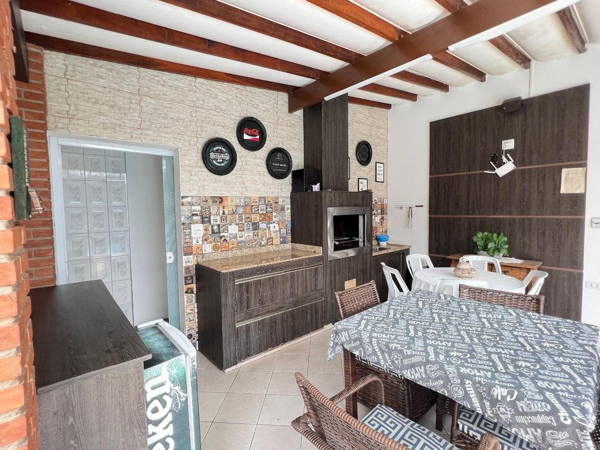 Casa agradável com piscina, a poucos passos da Praia Peruíbe Esterno foto