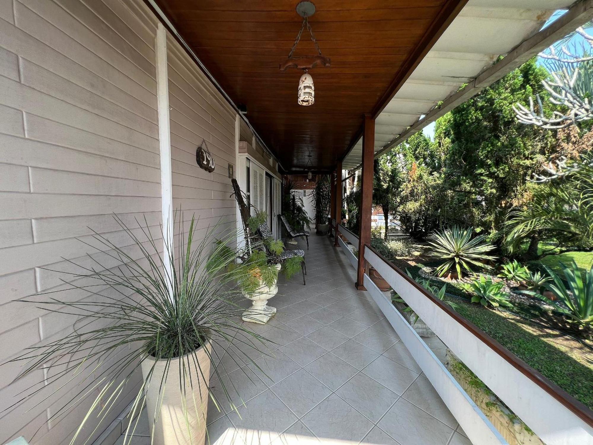 Casa agradável com piscina, a poucos passos da Praia Peruíbe Esterno foto